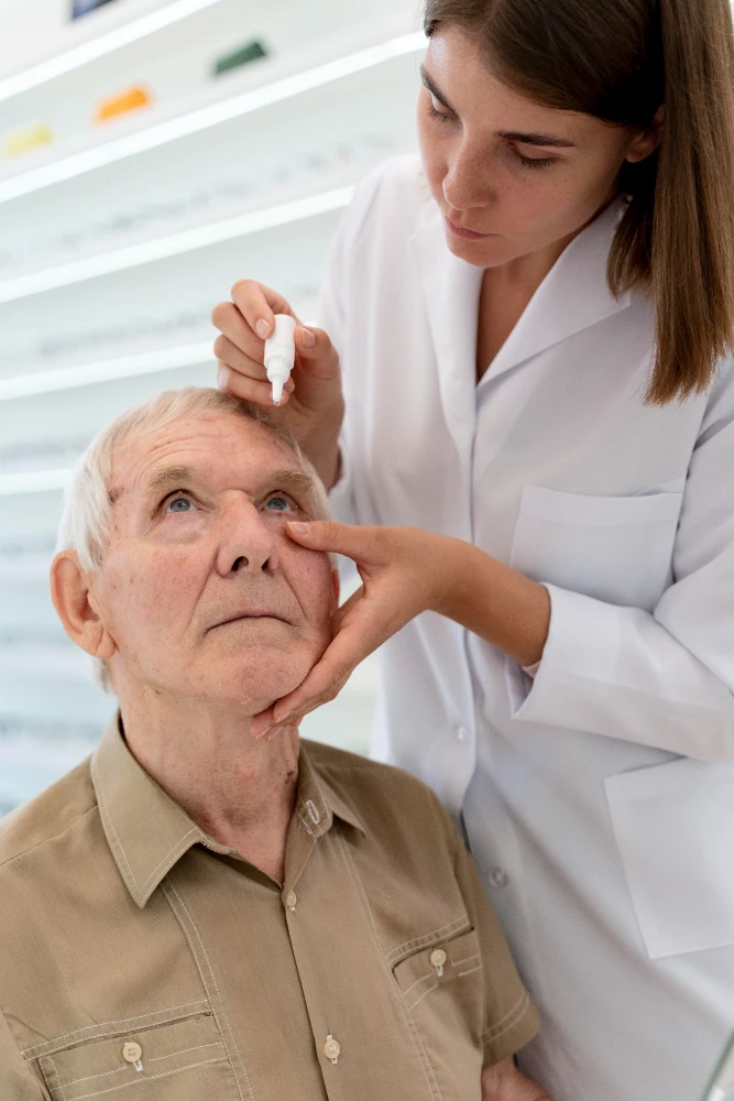 A senior having their prescribed eye drops