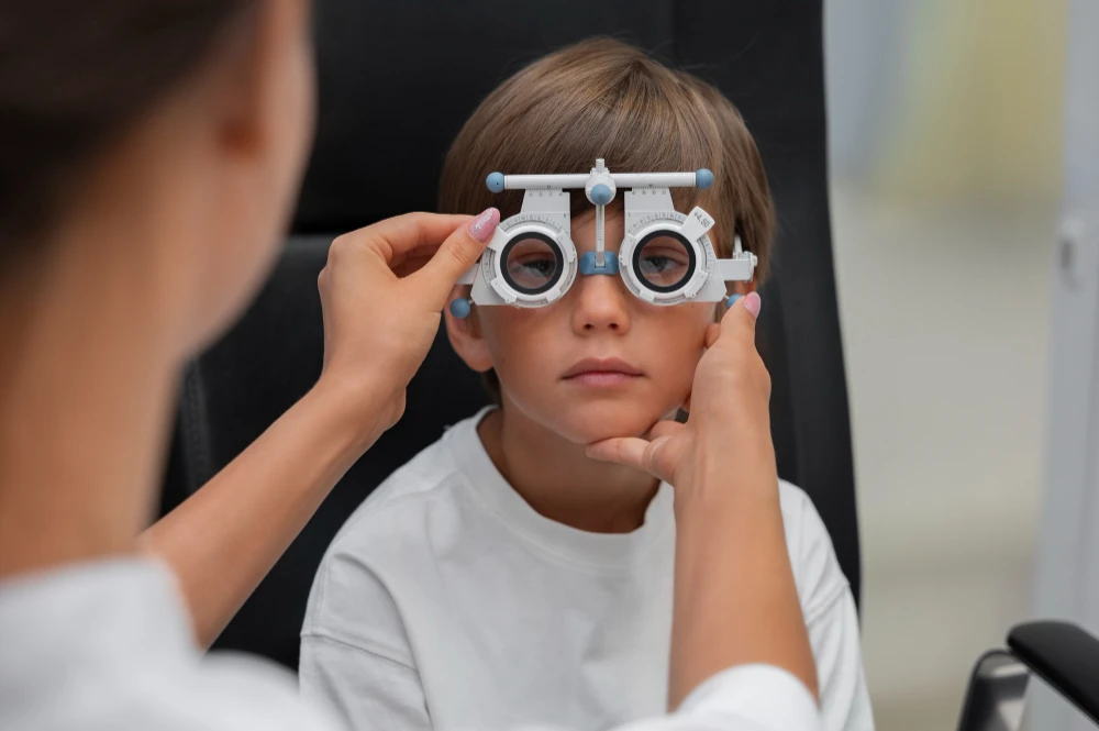 A kid having an eye exam at the Calgary eye clinic