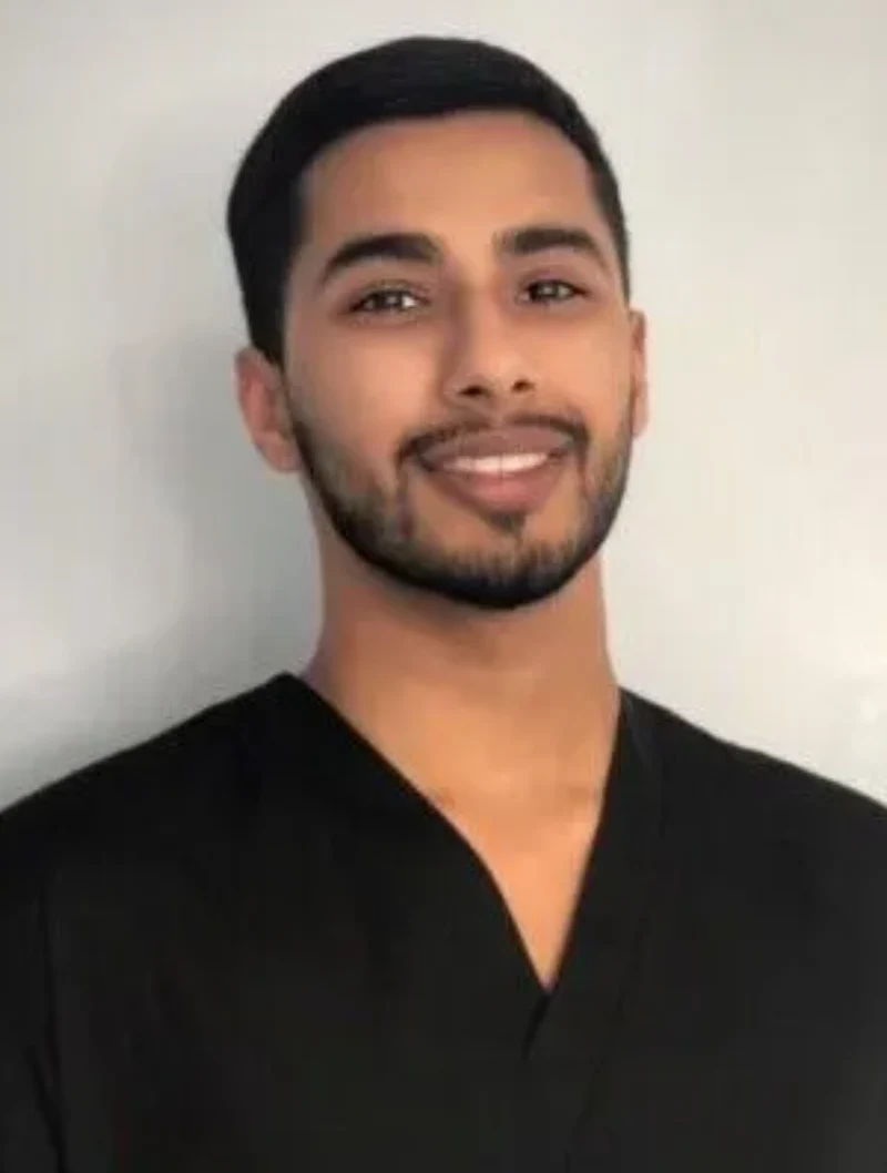 A portrait of Dr. Bobby Mundra, who is a graduate from the Illinois College of Optometry in Chicago