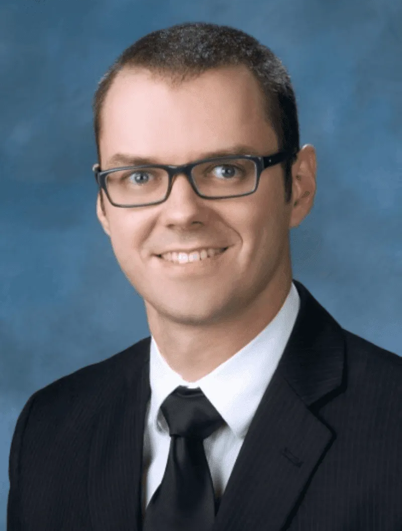 A studio photo of Dr. Greg Osherov who graduated with honours from NOVA Southeastern College of Optometry, Fort Lauderdale, Florida.